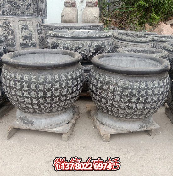 自然美學(xué)結(jié)合青石石雕、浮雕、編織、雕塑的戶外園林魚缸